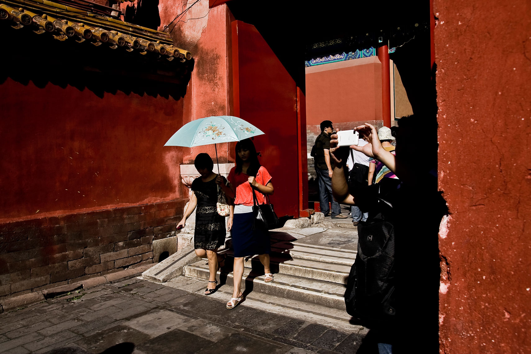 CHINA. Beijing, September 2012. Chinese tourists inside the Forbidden City.